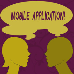 Text sign showing Mobile Application. Business photo showcasing application software designed to run on a mobile device Silhouette Sideview Profile Image of Man and Woman with Shared Thought Bubble