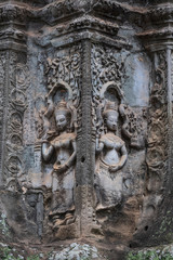Beautiful sculpture at the Ta Prohm temple ruins in Siem Reap, Cambodia