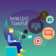 Text sign showing Knowledge Transfer. Business photo showcasing sharing or disseminating of knowledge and experience Man Sitting Down with Laptop on his Lap and SEO Driver Icons on Blank Space