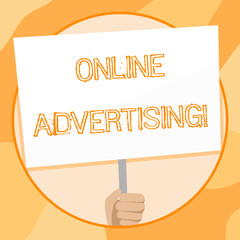 Handwriting text writing Online Advertising. Conceptual photo uses the Internet to marketing messages to customers Hand Holding Blank White Placard Supported by Handle for Social Awareness