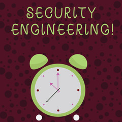 Word writing text Security Engineering. Business photo showcasing focus on the security aspects in the design of systems Colorful Round Analog Two Bell Alarm Desk Clock with Seconds Hand photo
