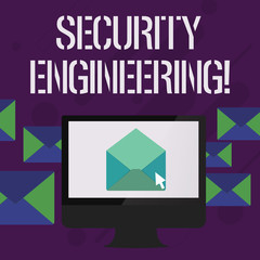 Writing note showing Security Engineering. Business concept for focus on the security aspects in the design of systems Open Envelope inside Computer Letter Casing Surrounds the PC
