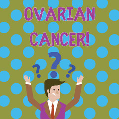 Handwriting text writing Ovarian Cancer. Conceptual photo any cancerous growth that forms in the tissues of the ovary Confused Businessman Raising Both Arms with Question Marks Above his Head