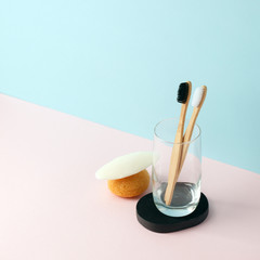 Zero waste bathroom. Natural products sponge, Konjac, washcloth, soap, glass tumbler, toothbrush on modern 3d rendering imitation background, minimal surreal concept