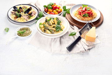 Plates of pasta. Image with copy space