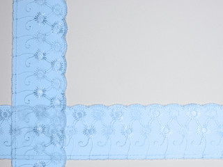 Blue lace on a white background