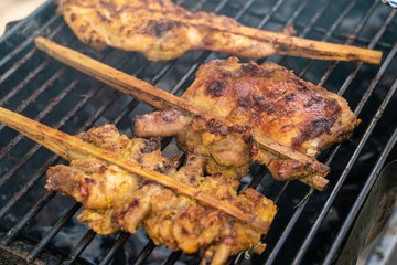 Chicken grilled with smoke and pepper