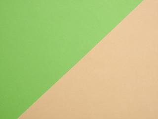 Green and beige background, divided diagonally