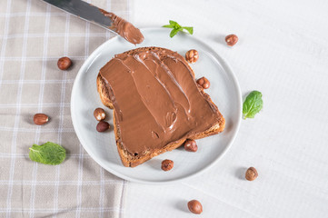 Sweet sandwich with chocolate and nuts