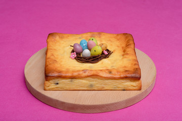 cake with chocolate nest and eggs candies