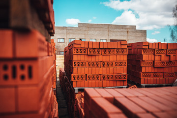 Industrial production of bricks. brick production line in factory, stacked bricks