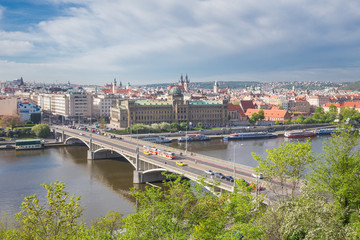 Fototapeta na wymiar City Prague, Czech Republic. View from the mountain to the river and bridge. Spring. 2019. 24. April. Travel photo.