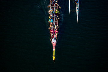 23/04/2019 Zhytomyr, Ukraine, Kayaking with rowers sailing along the river, athletes are practicing at sunset © Alexeiy