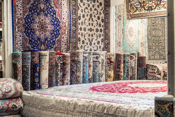 Textiles and carpets in the bazaar. Arab market.