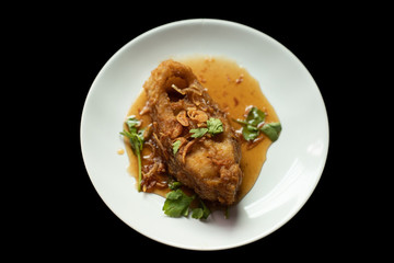 Fried Fish with Chilli on dish white.