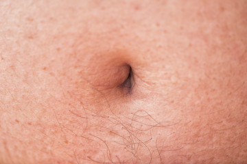Fototapeta premium Close up boy navel ,Navel of fat people, stomach,Belly of men