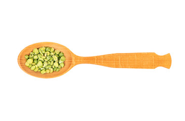 Dry green peas in spoon