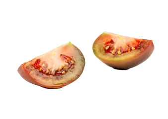 Fototapeta na wymiar Two slices kumato tomato
