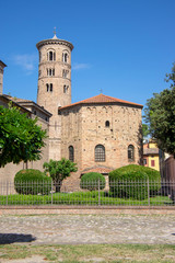 Old beautiful medieval ancient round italian red brick bell tower in Ravenna