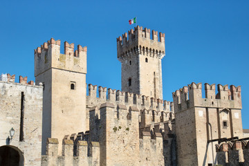 Tower of castle of Sirmione. Detail of medieval building Structure in Garda Lake (Italy) © missizio01