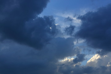 sunlight through cloud on dramatic sky background
