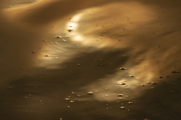 Sky reflecting water.