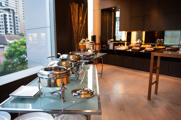 Silver container for food in the buffet