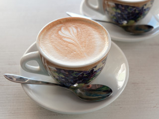 cup of mococino cappuccino coffee on the table