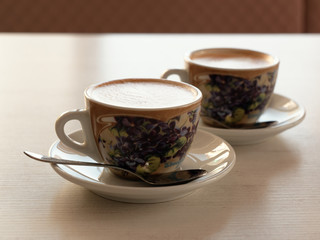 cup of mococino cappuccino coffee on the table