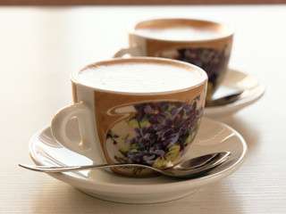 cup of mococino cappuccino coffee on the table