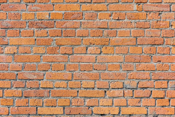 Red brick wall background inside of the room