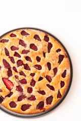 Food concept homemade buttery vanilla Strawberry Cake on white background with copy apsce