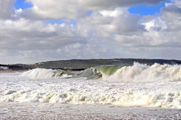 Big waves on the beach of Nazare
