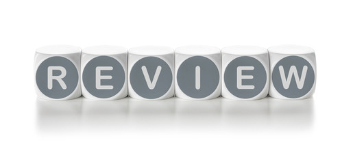 Letter dice on a white background - Review