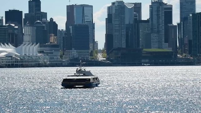 Sea bus  comming from Downtown towards Lonsdale Quay , day dime. A part of the transportation system in Metro Vancouver     Ver.2