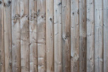 Wooden fence texture, wooden background. Background texture of old white painted wooden lining boards wall