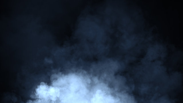 Abstract blue smoke moves on a black background . The concept of aromatherapy