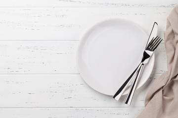 Empty plate with cutlery