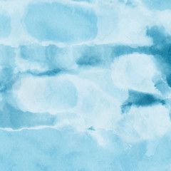 Colorful winter blue ink and watercolor textures on white paper background. Paint leaks and ombre effects. Hand painted abstract image. Deep sea.