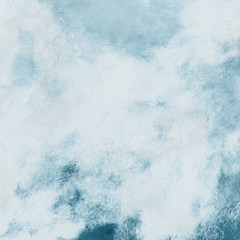 Colorful winter blue ink and watercolor textures on white paper background. Paint leaks and ombre effects. Hand painted abstract image. Deep sea.