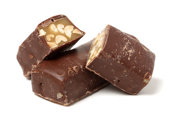 Chocolate peanut candy on white background