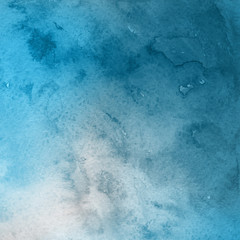 Colorful winter blue ink and watercolor textures on white paper background. Paint leaks and ombre effects. Hand painted abstract image. Deep sea.