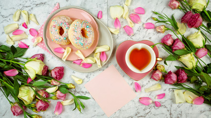 Feminine leisure and relaxation flat lay overhead, sunday morning brunch, Mother's Day, birthday or Valentine's celebration.