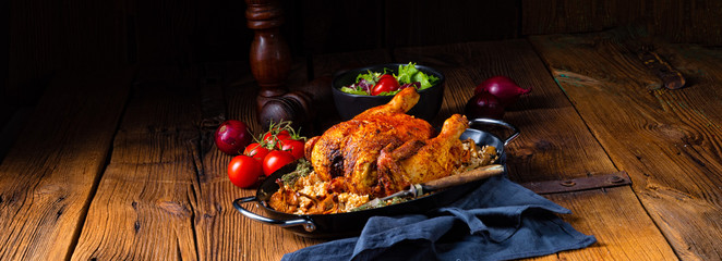 Grilled spicy chicken with barley groats and mushrooms