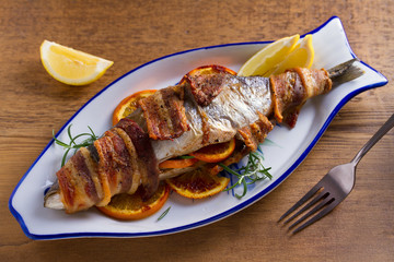 Grilled Bacon-Wrapped Whitefish. Fish wrapped with bacon