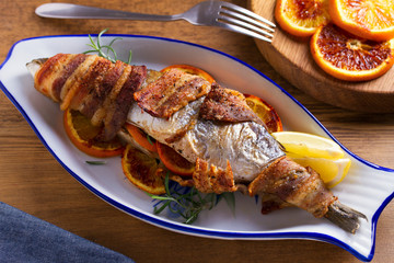 Grilled Bacon-Wrapped Whitefish. Fish wrapped with bacon