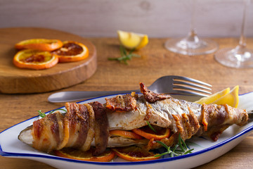 Grilled Bacon-Wrapped Whitefish. Fish wrapped with bacon