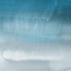 Colorful winter blue ink and watercolor textures on white paper background. Paint leaks and ombre effects. Hand painted abstract image. Deep sea.