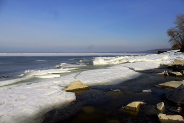 beach in winter. frozen sea