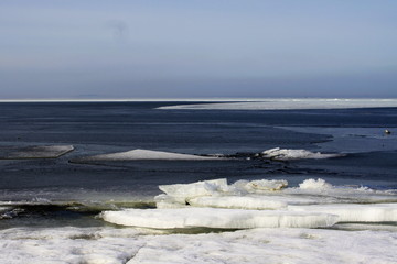 beach in winter. frozen sea